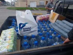 Entrega de donaciones por las Inundaciones